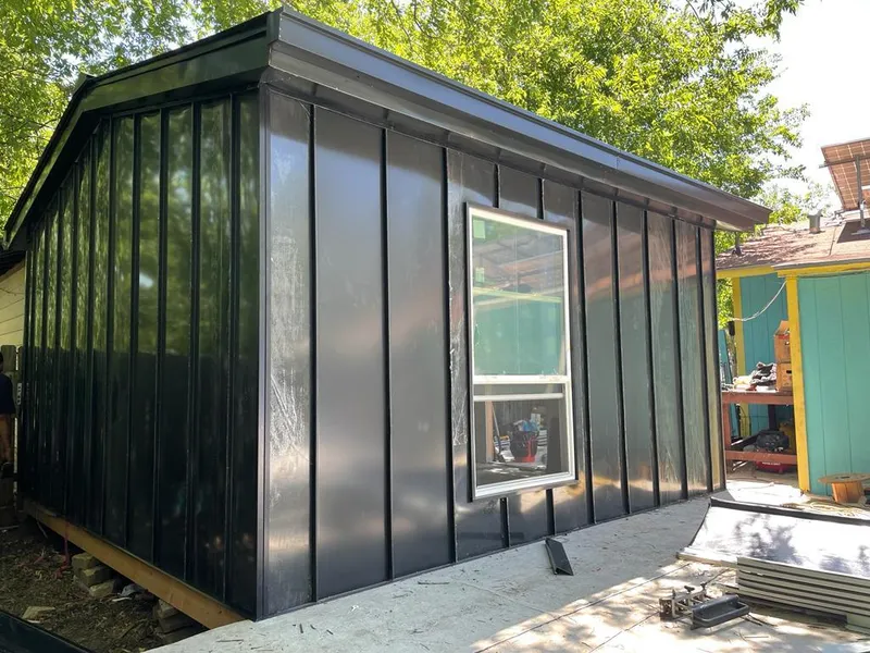 Black standing seam metal wall panels for Roof Inspection in Macon